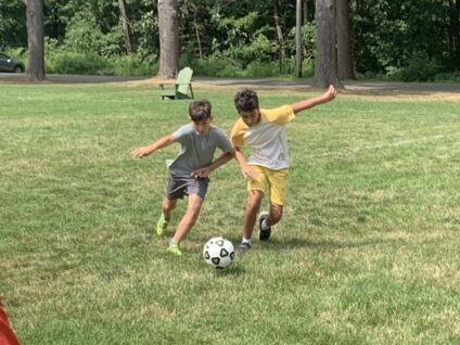 campers playing soccer.